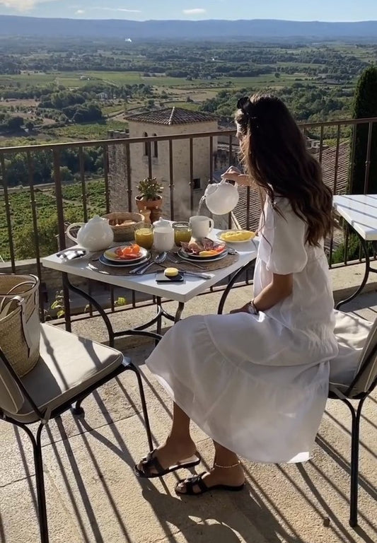 Woman in linen dress in Italy